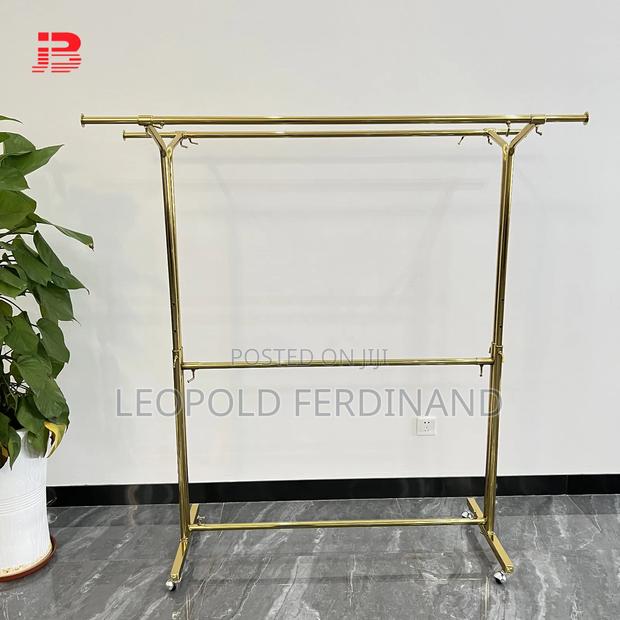 Adjustable Gold Hangers Racks · Photo 1