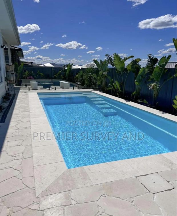 We Construct Modern Swimming Pools · Photo 3