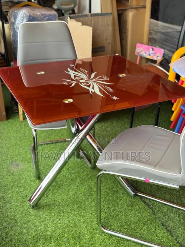 Modern 2- 1glass Dining Room Set · Photo 1