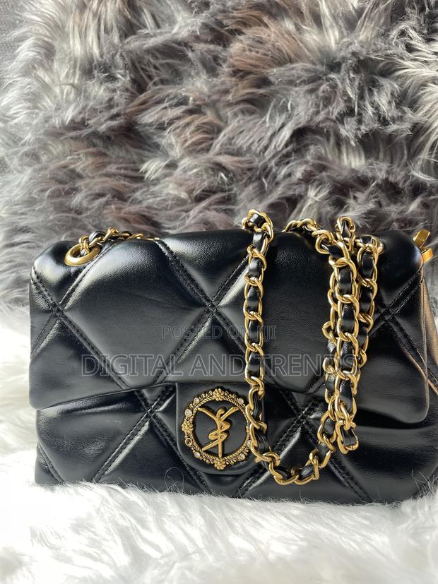 Black Quilted Leather Shoulder Bag · Photo 1