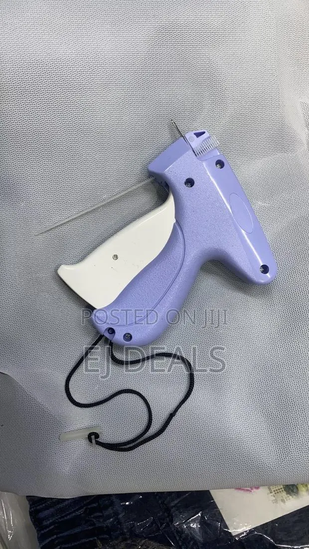 Tagging Gun With Needle and Tag Pins for Cloth · Photo 1