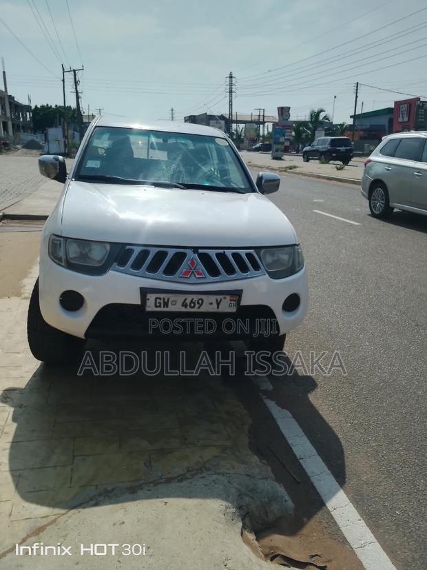 Mitsubishi L200 Club Cab 2.5 136hp 4WD 2007 White · Photo 1