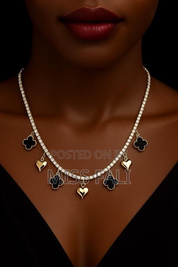 Tennis and Clove Charms Necklace · Photo 1