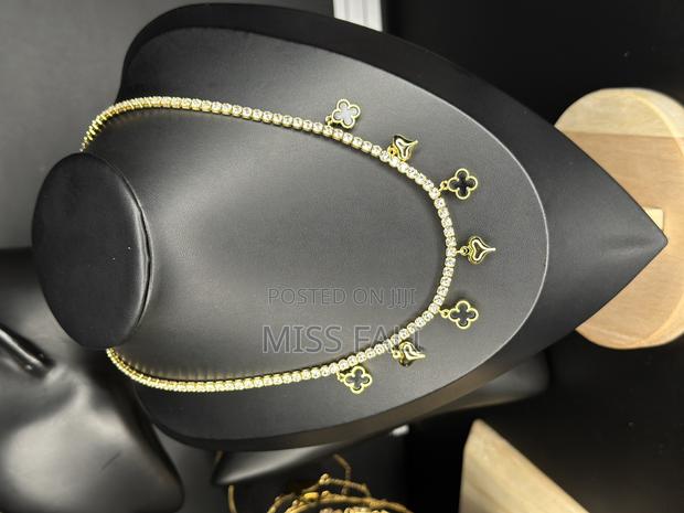 Tennis and Clove Charms Necklace · Photo 7