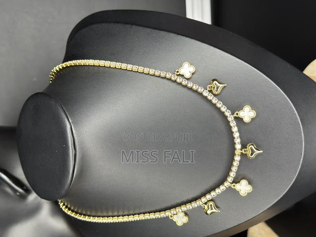 Tennis and Clove Charms Necklace · Photo 6