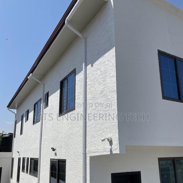 Premium PVC Rain Gutter Installation · Photo 1