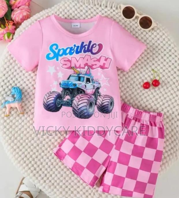 Kids' Pink "Sparkle Smash" Car Print T-Shirt Checkered Shorts Set. · Photo 1