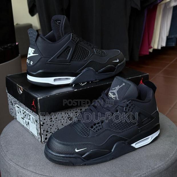 Air Jordan 4 Black Leather Print Sneaker · Photo 1
