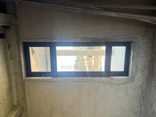 Awning Window With Top and Bottom Fixed. · Photo 1