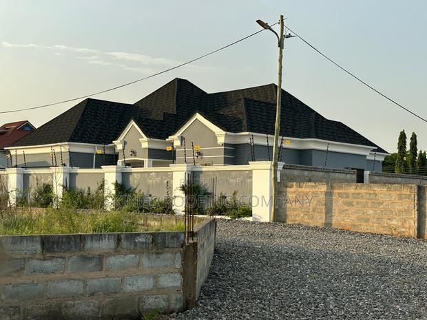 Striking Radiant Shingle Euro Roofing Tiles Project · Photo 1