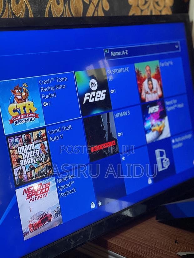 Ps4 Slim With Fc26 7 Games · Photo 4