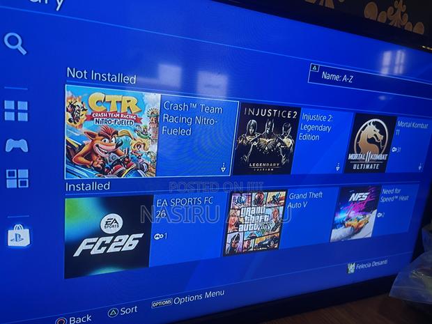 Ps4 Slim With Fc26 7 Games · Photo 3
