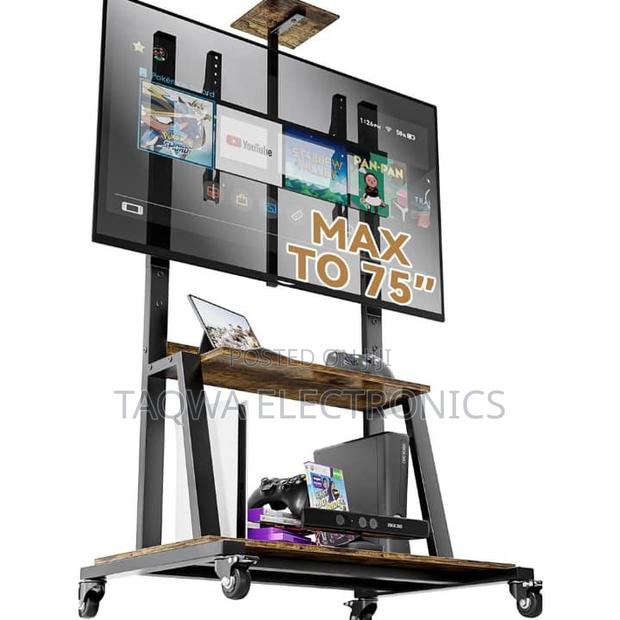 Better In Moving Your Tv, 32-75 Inch Universal Tv Stand · Photo 1