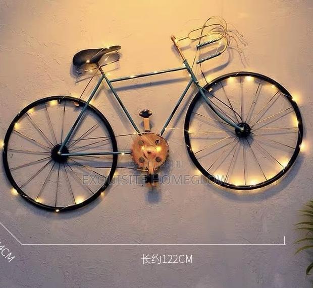 Vintange-Style Metal Bicycle Wall Art Piece With Added String Lights · Photo 2