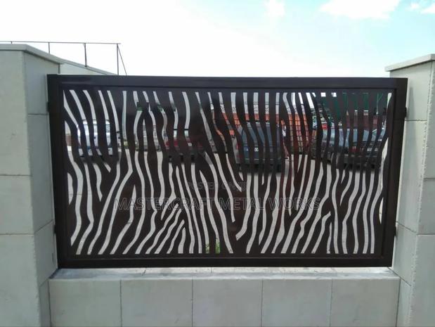 Metal Fence Wall Design · Photo 1