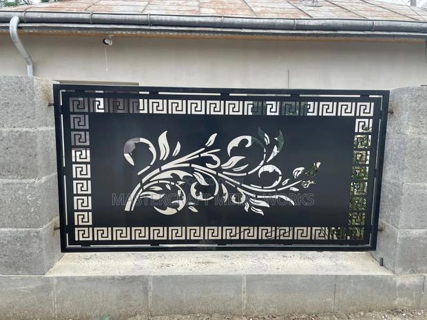 Metal Fence Design · Photo 1