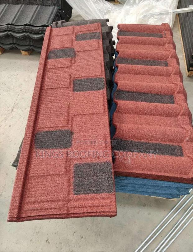 Packed Red and Black Colored Shingle Euro Roofing · Photo 1