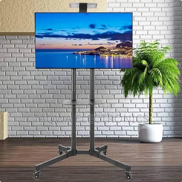 Long Movable Universal Tv Stand 32-70” · Photo 1