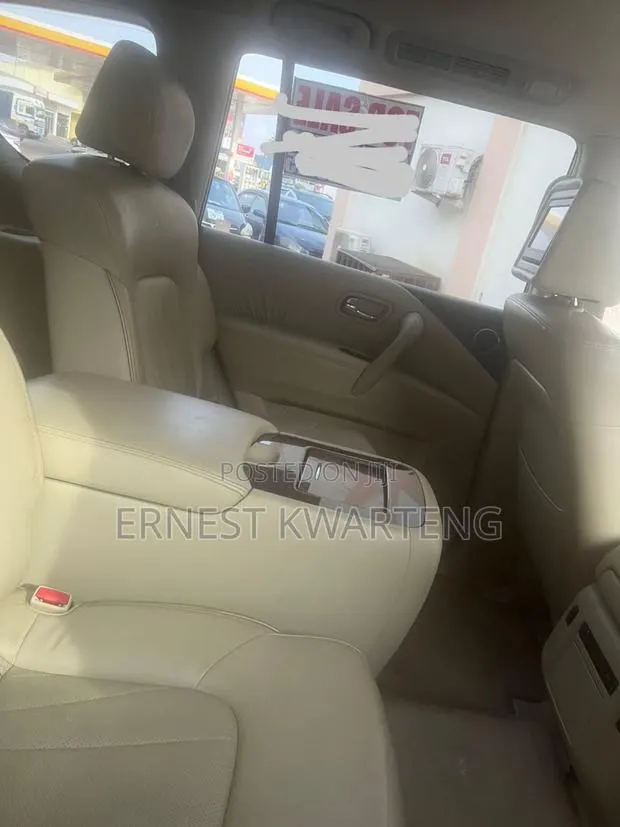 Infiniti QX80 2016 White · Photo 1