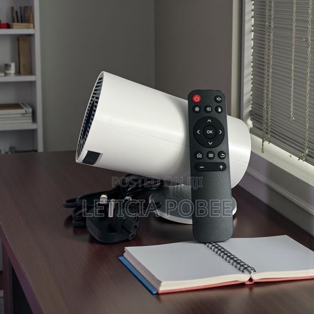 Compact Hd Home Projector + Remote — Crystal-clear Viewing · Photo 1