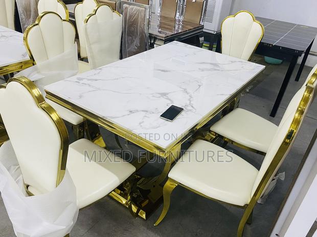 Modern Marble Dining Table With 6 Leather Chairs · Photo 1
