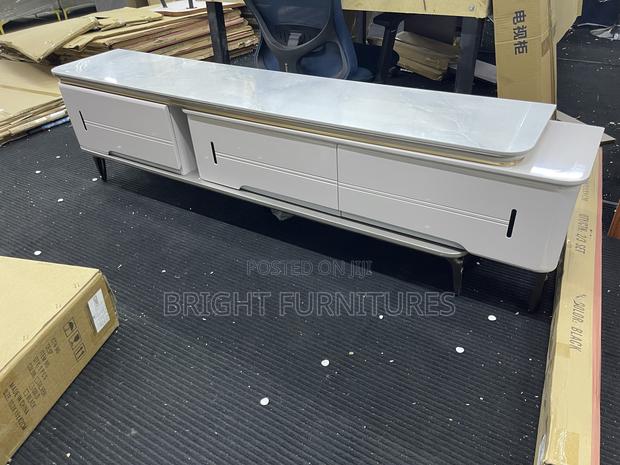 Tv Stand Adjustable With Drawers · Photo 1