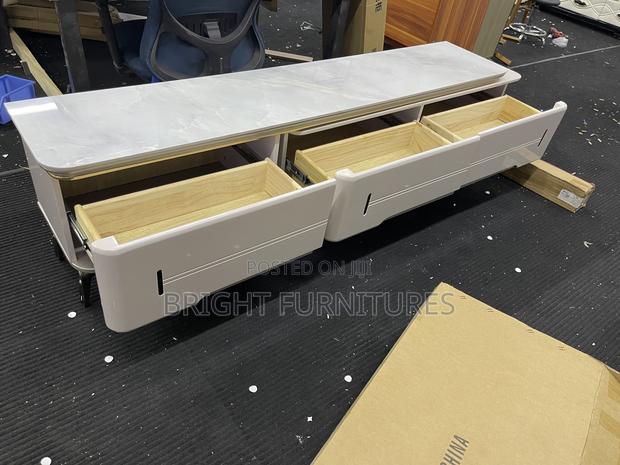 Tv Stand Adjustable With Drawers · Photo 2