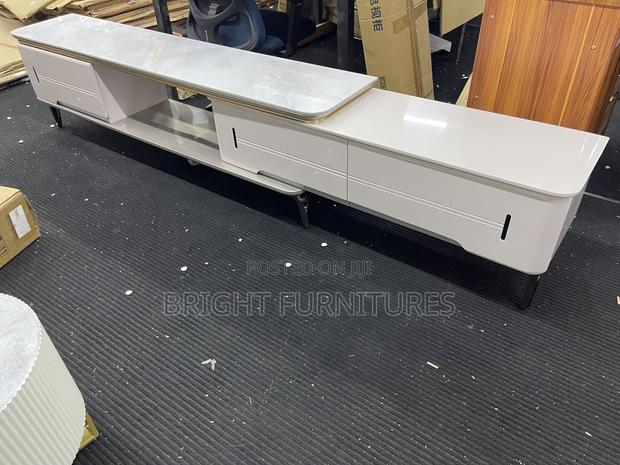 Tv Stand Adjustable With Drawers · Photo 3