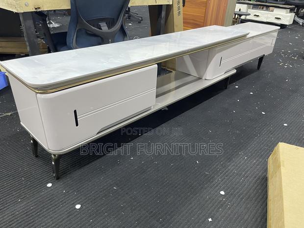 Tv Stand Adjustable With Drawers · Photo 4