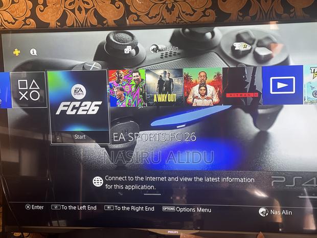 Ps4 Slim With Fc26 7 Games · Photo 1