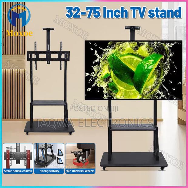 Up to 50kg Tv Weight-32-75-Inches Universal Movable Tv Stand · Photo 1