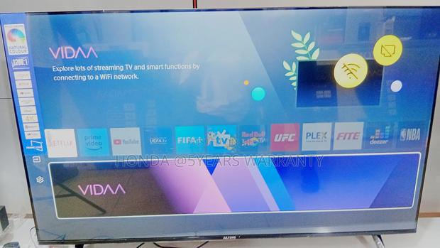 **Ailyons 55" Smart Tv High-Definition Viewing** · Photo 2