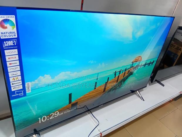 P**Ailyons 55" Smart Tv Modern Slim Design** · Photo 1