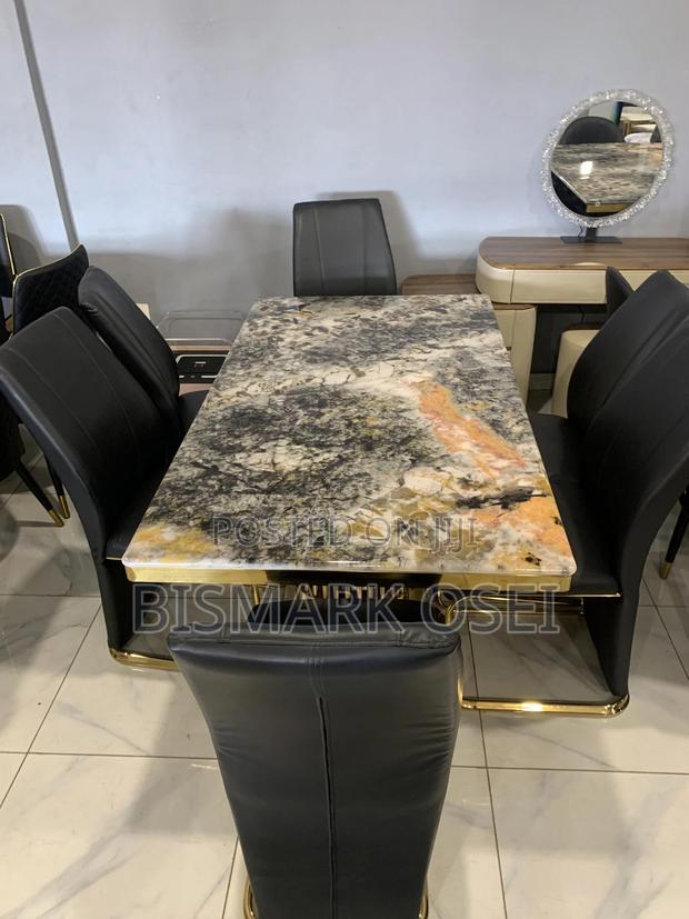 A Beautiful 6 Seater Dining Set, With a Golden Designs · Photo 2