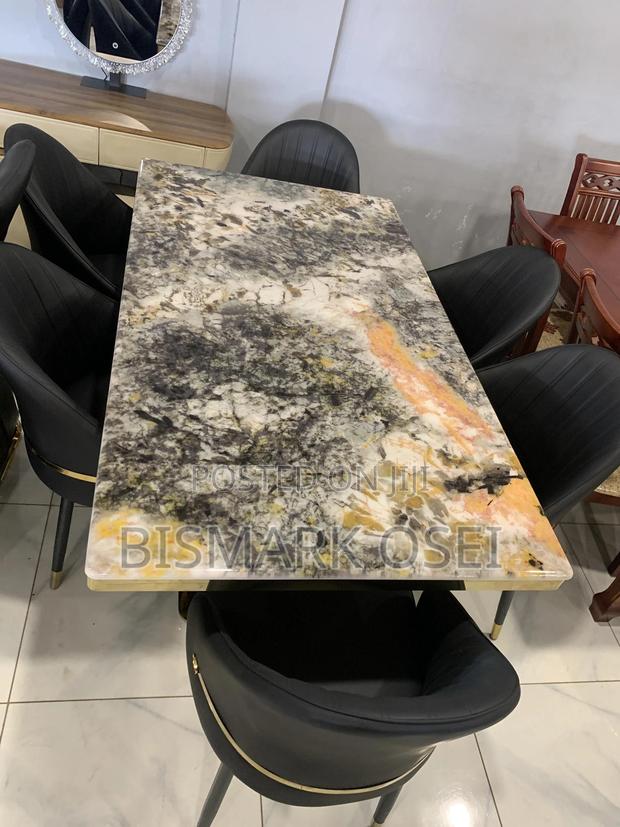 A Beautiful 6 Seater Dining Set, With a Golden Designs · Photo 1