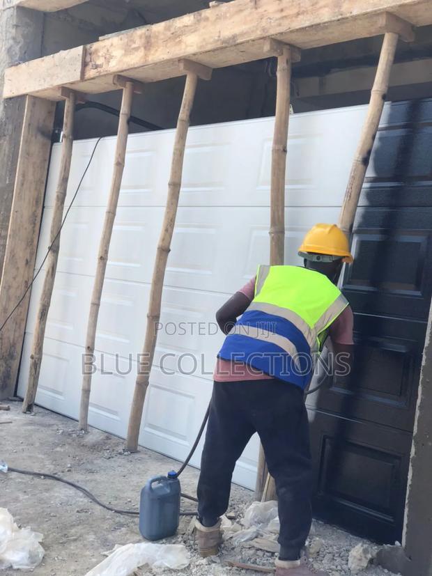 Coated Garage Door · Photo 1