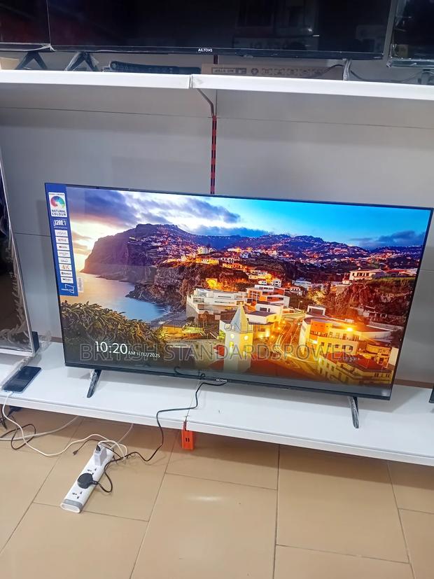 Ailyons 55” Smart Tv for Sweet Viewing · Photo 1