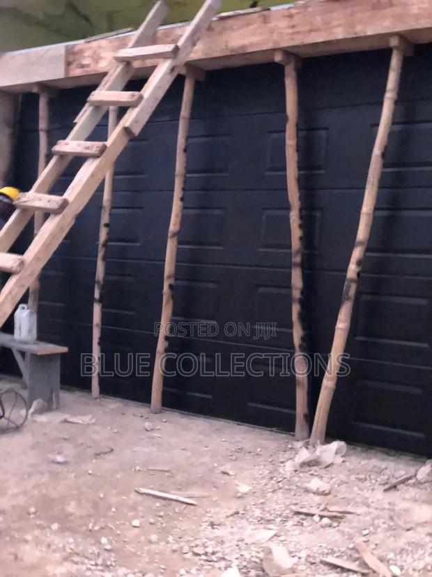 Automated Garage Door 14ft · Photo 1