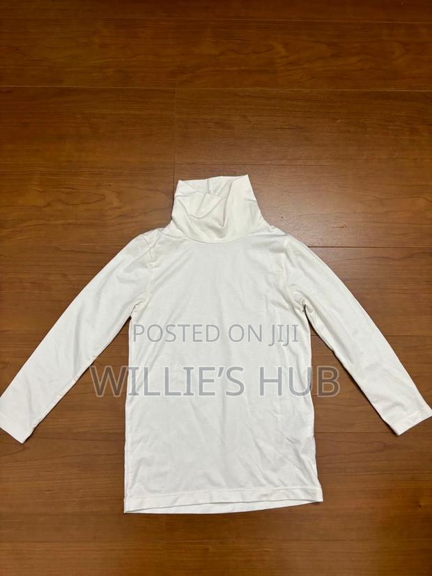 Polo Neck Long Sleeve · Photo 3