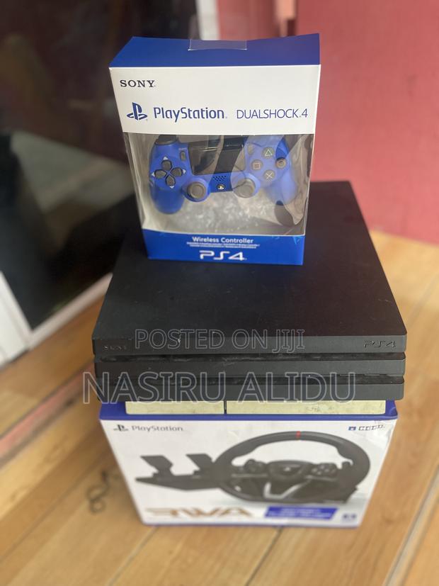Ps4 Pro With 10-15 Good Games Two Controllers . From Home Use · Photo 2