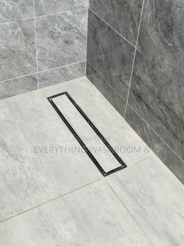 Tiles Floor Drain · Photo 2