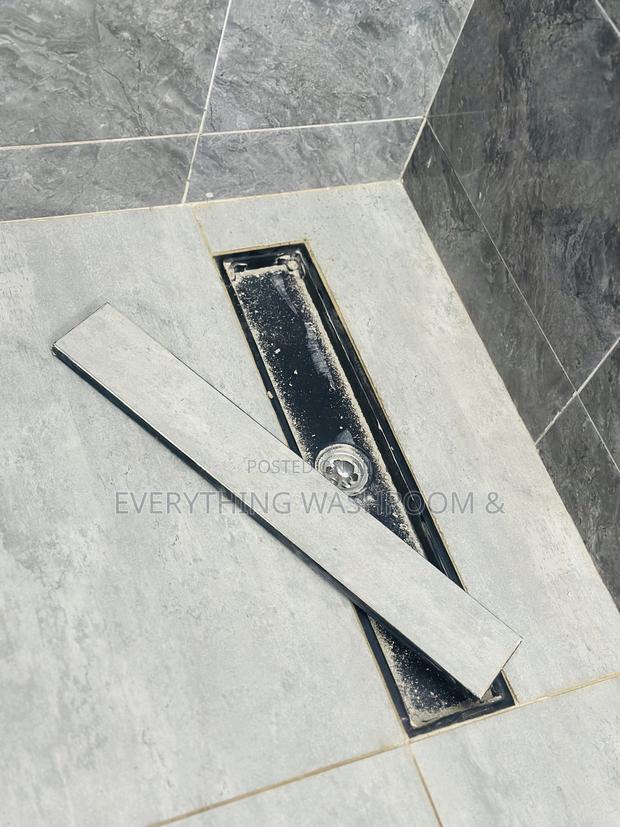 Tiles Floor Drain · Photo 1