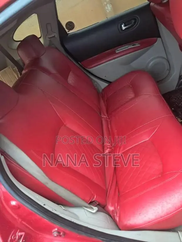 Nissan Rogue 2009 Red · Photo 1
