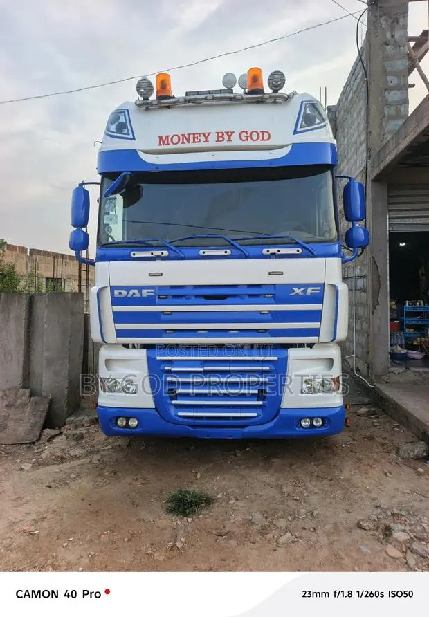 DAF XF105-510 and Trailer Going for Cool Prize · Photo 1