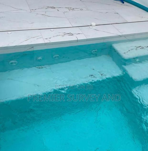Affordable Swimming Pool Construction · Photo 3