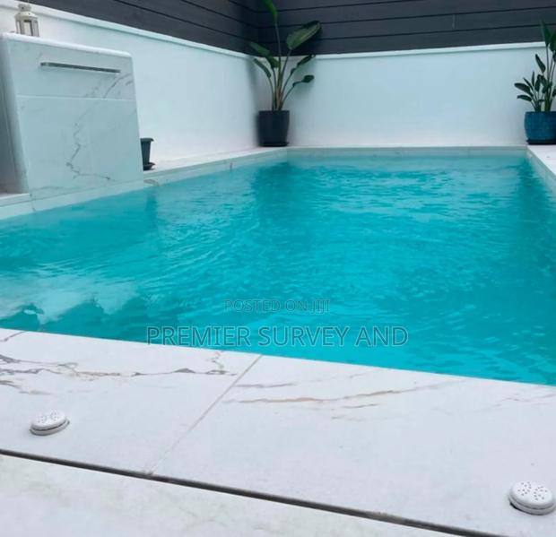 Affordable Swimming Pool Construction · Photo 4