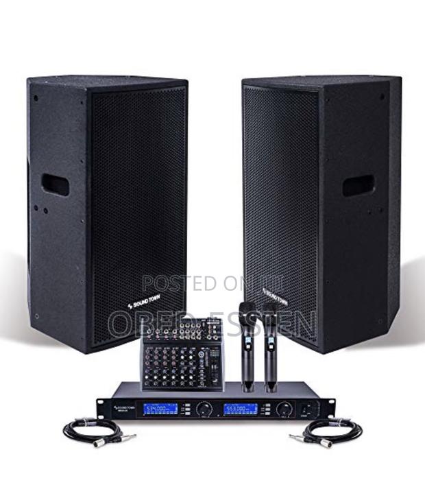 A Pair of JBL Speakers With Amp and Microphone · Photo 2