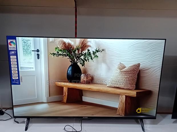 Ailyons 55” Smart Tv for Family Entertainment · Photo 1