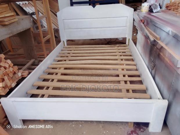 Simple White Bed Frame · Photo 1