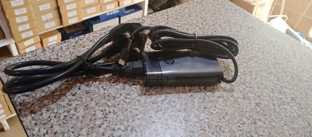 Hp Type C Adapter 20v3.25 / 15v3 / 12v3 / 9v2 /5v2 65wat · Photo 1